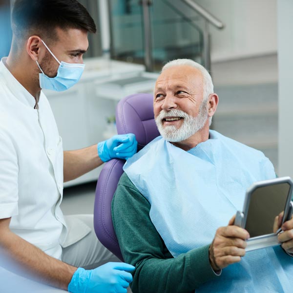 senior man in dental chair